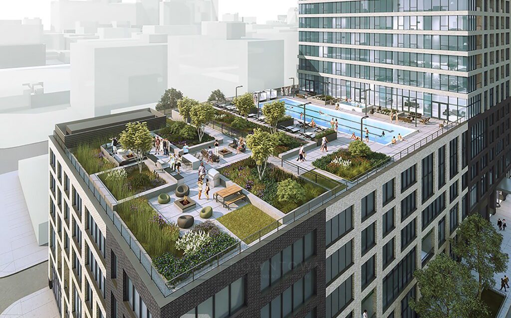 Rooftop garden with seating areas, trees, and a swimming pool. Several people are relaxing and walking. The background shows a modern cityscape with a blend of glass and brick buildings.