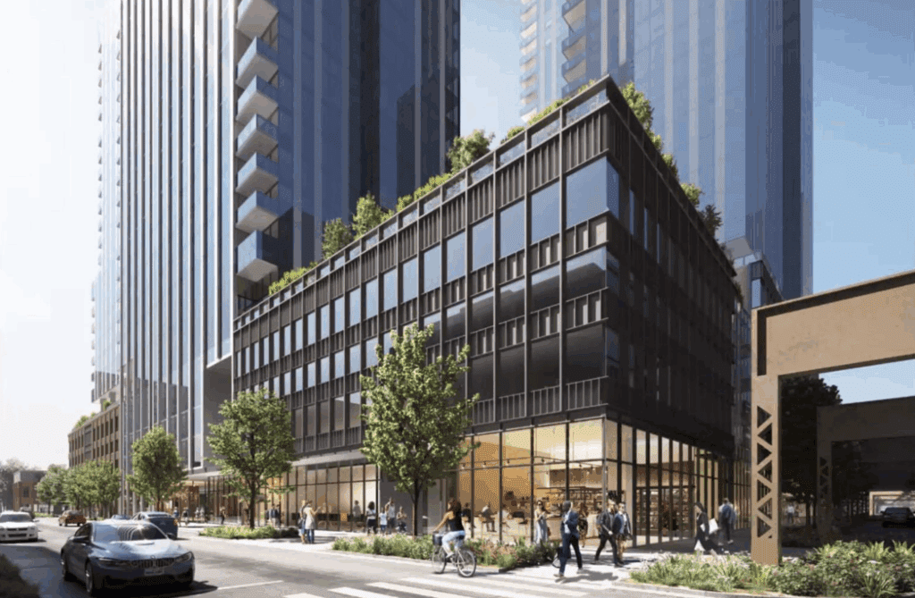 A group of people walking on a street.